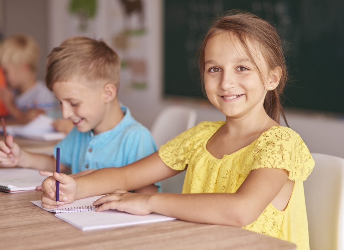 Boy and girl in one desk
